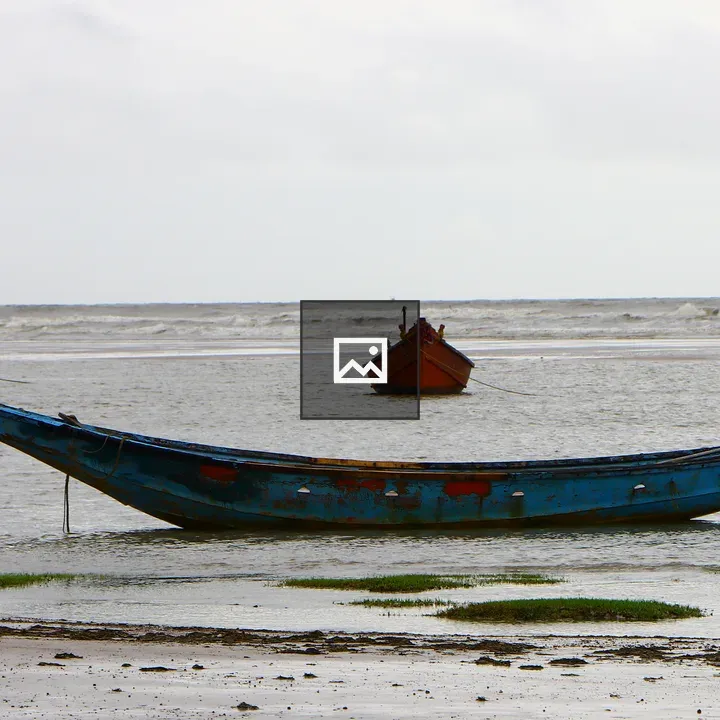 Boat at low tide in Talshari