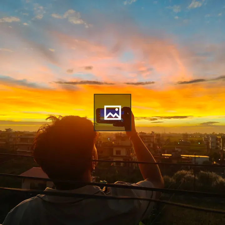 Person on Balcony at Sunset