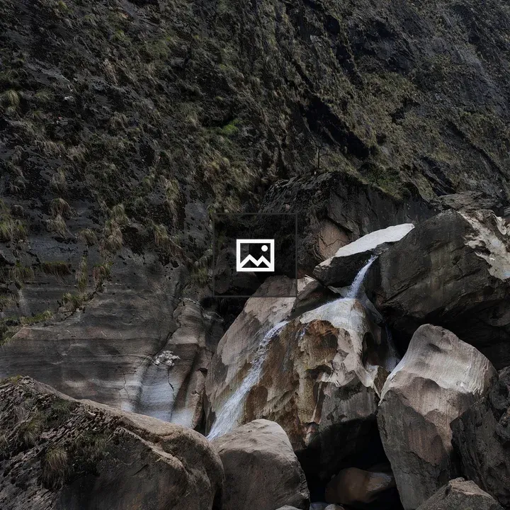 Waterfall on gray rocks