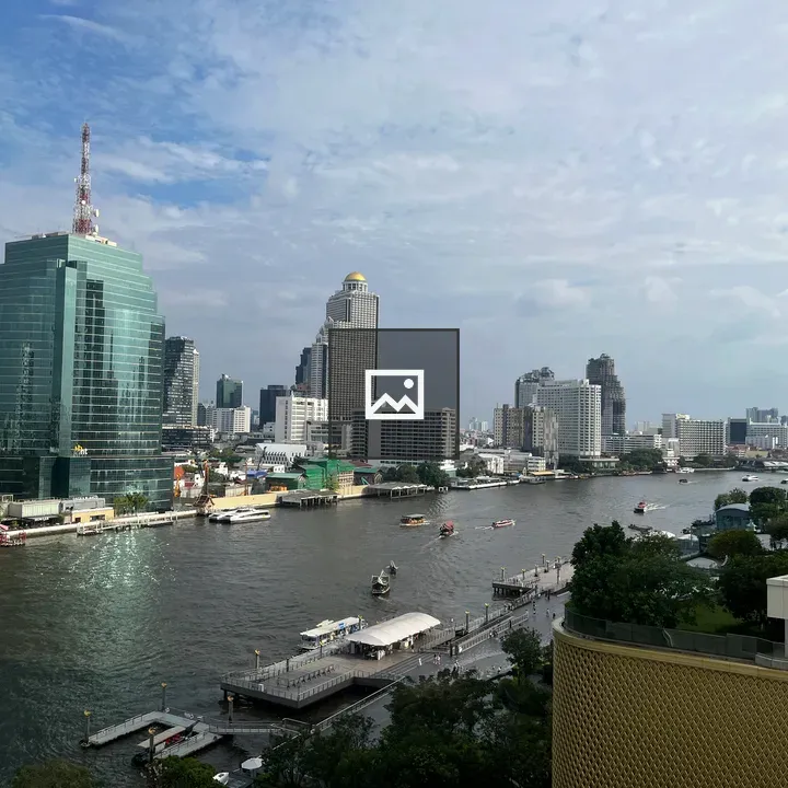Chao Phraya River Bangkok boat and skyline