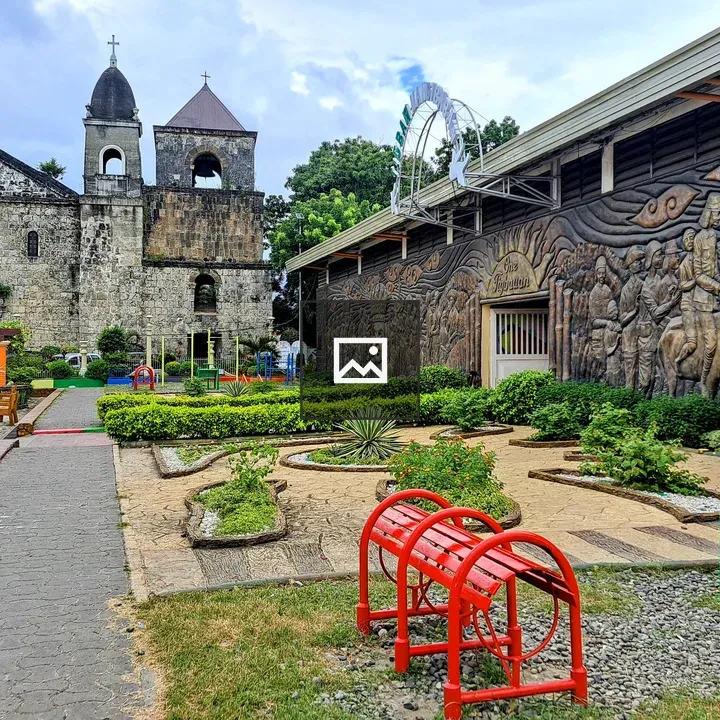 Mural wall with church and playground