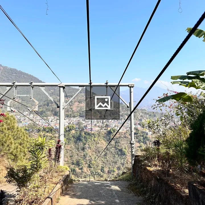Cable car wires and city view