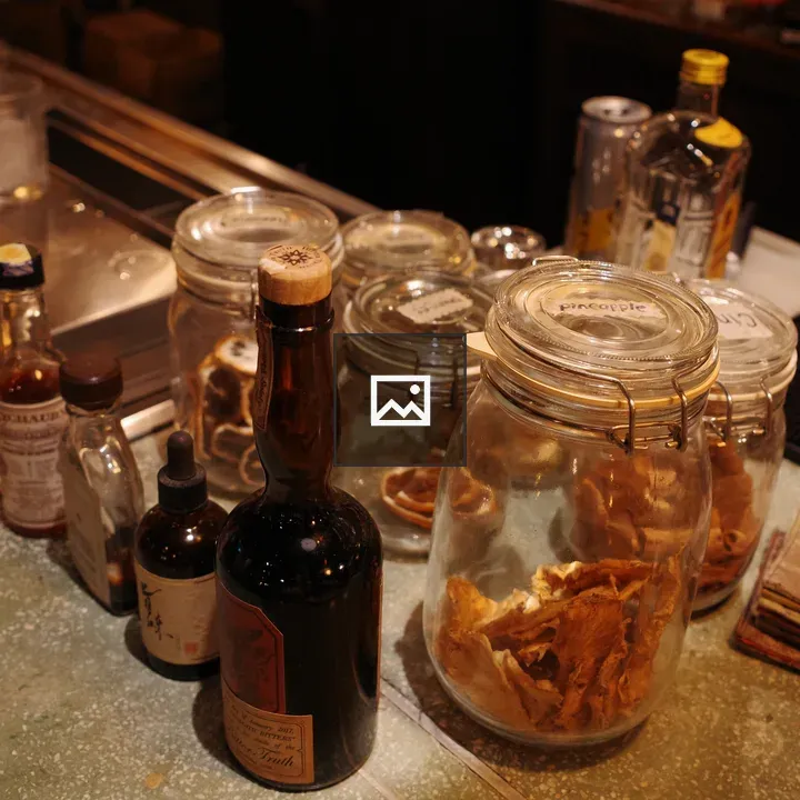 Bar counter with bottles and jars