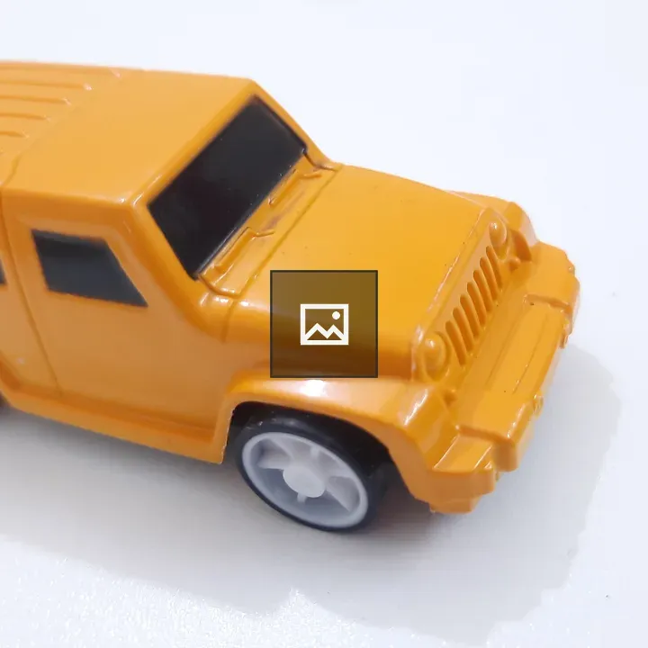 Orange toy SUV