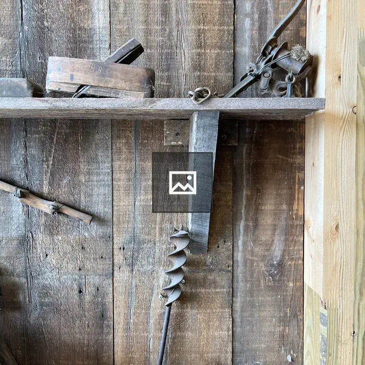 Antique tools on a shelf