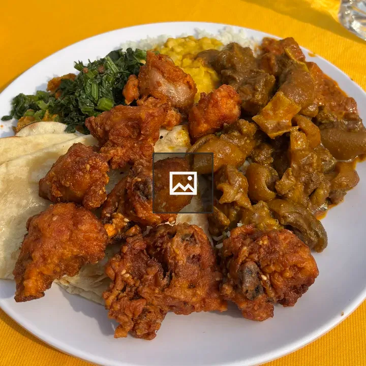 Plate with fried chicken and flatbread