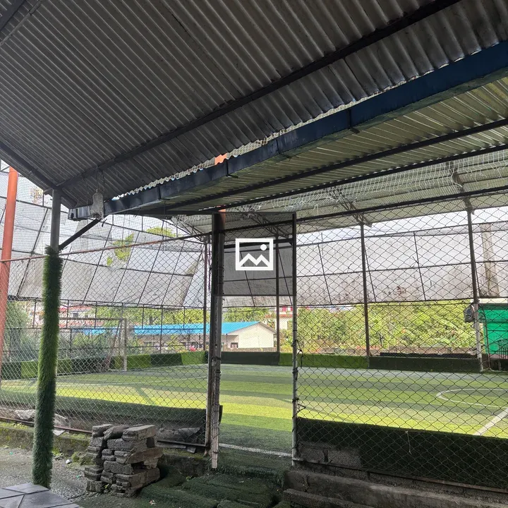Interior of fenced sports facility