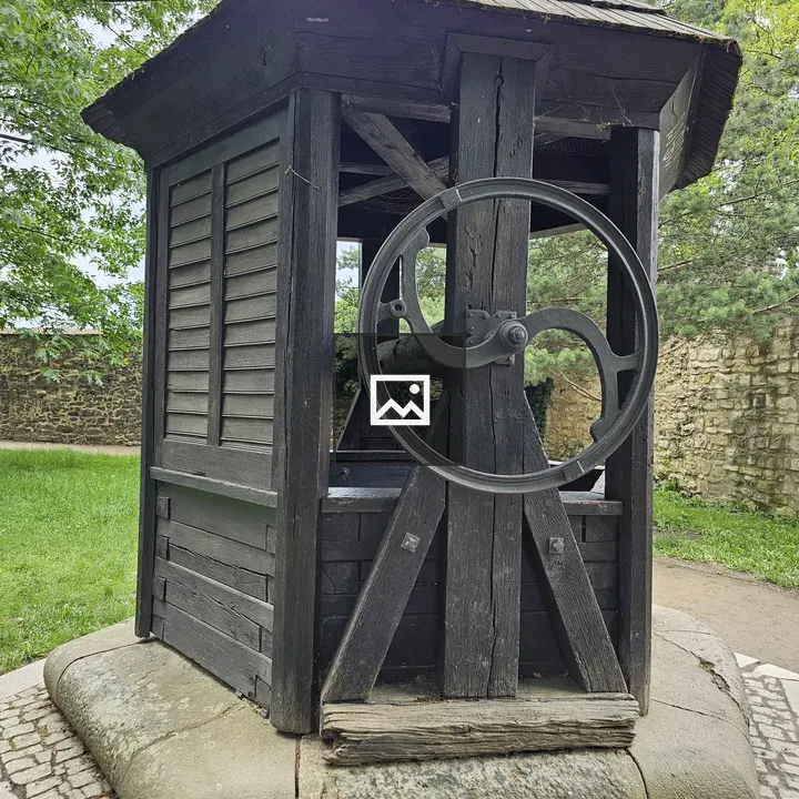 Traditional wooden well façade