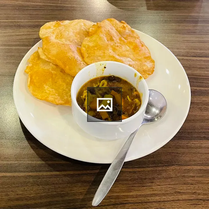 Plate of fried bread and stew