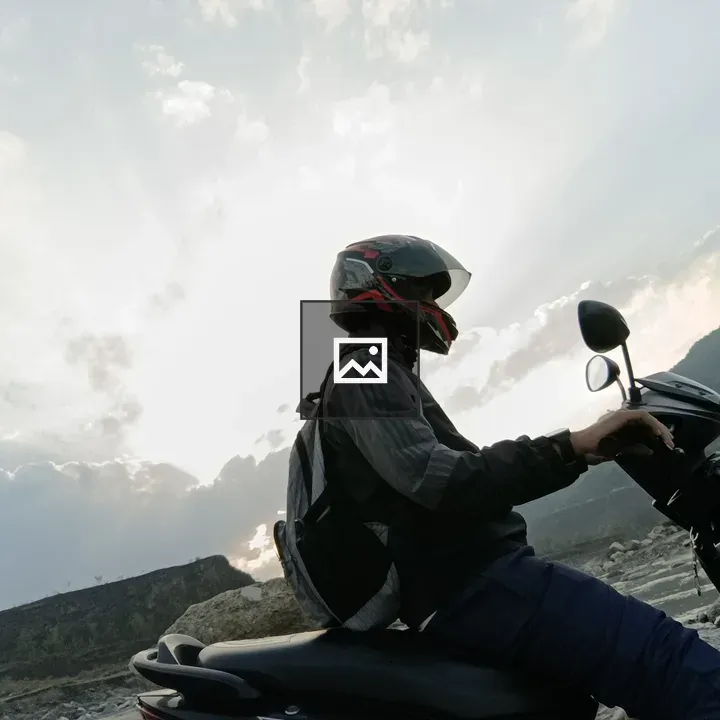 Scooter Rider on Rocky Terrain