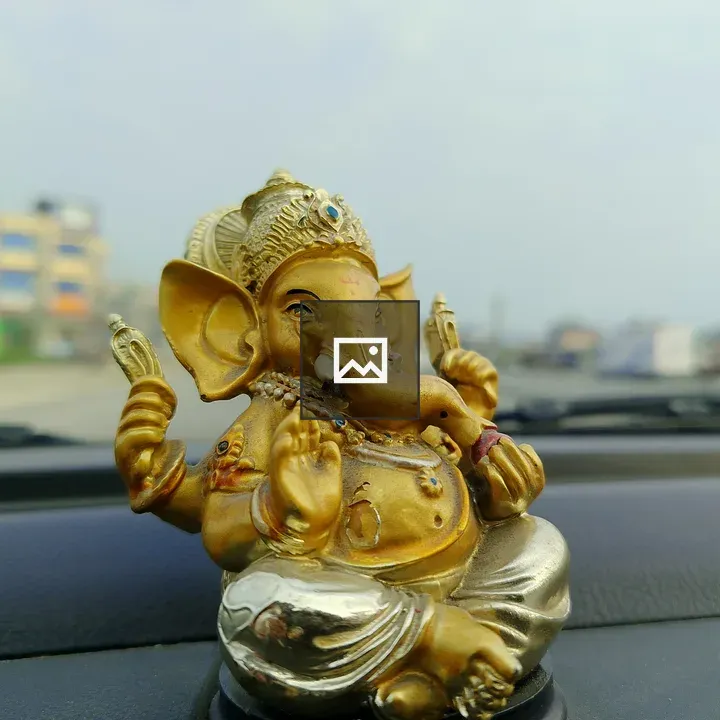 Golden Ganesha Statue on Car