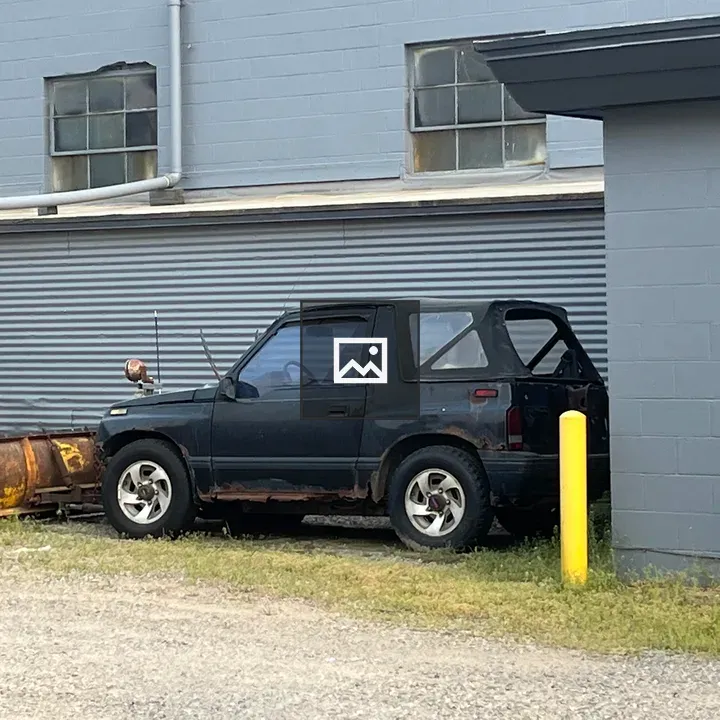 Undersized Suzuki with Plow Blade