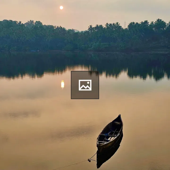 Sunrise over Chaliyar River with Boat