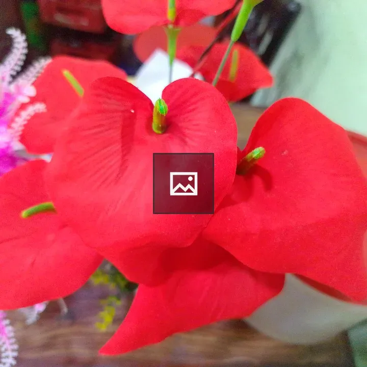 Close-up of red artificial flowers