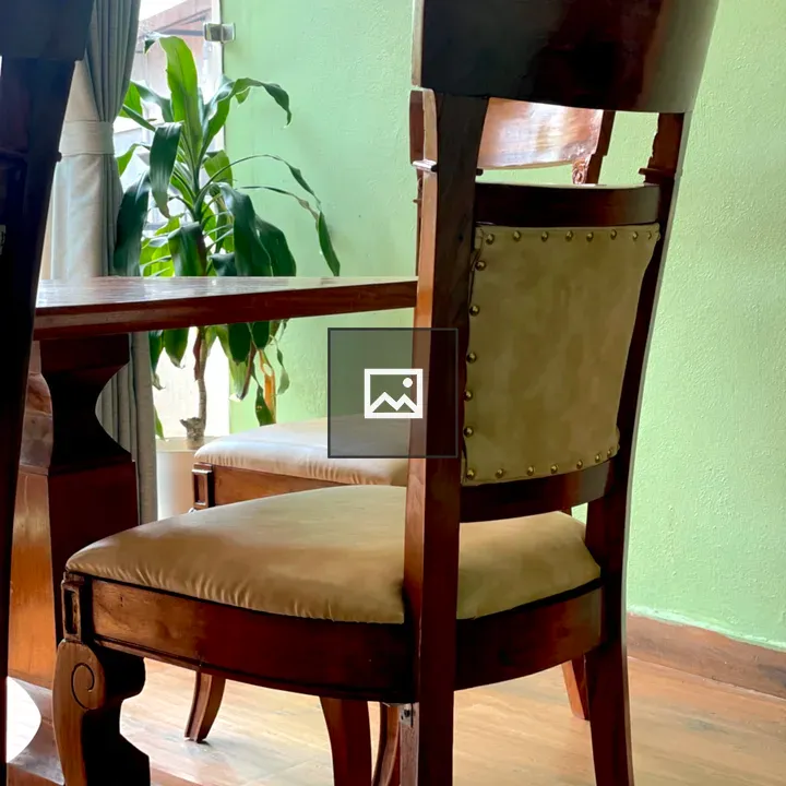 Wooden Chair by Table