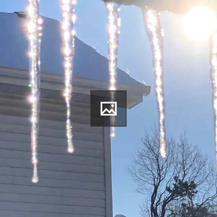 Roof gutter snow icicles