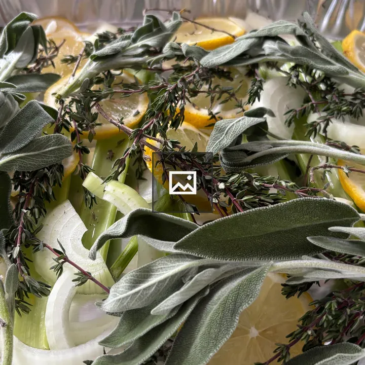 Sage and herbs in a tin pan