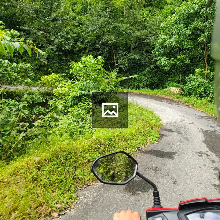 Hand on scooter handlebar