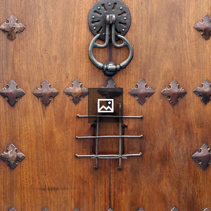 Old wooden door with iron accents