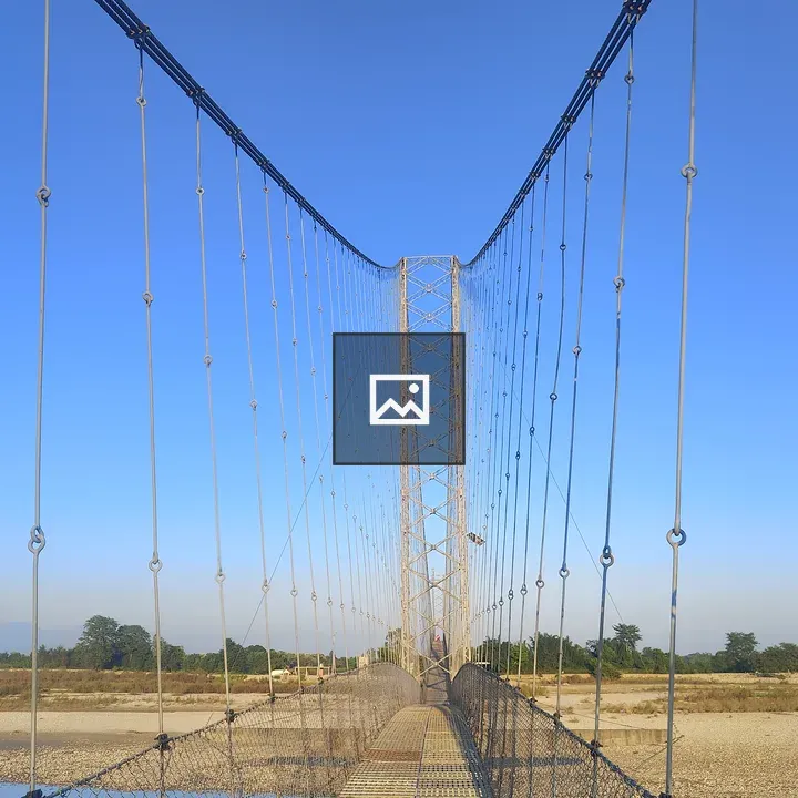 Suspension bridge over dry riverbed