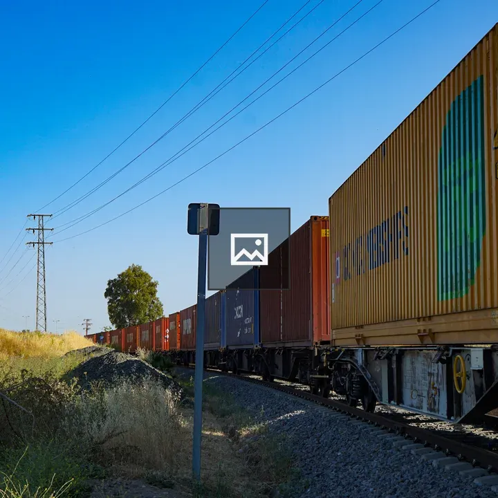 Huge train leaving a freight station