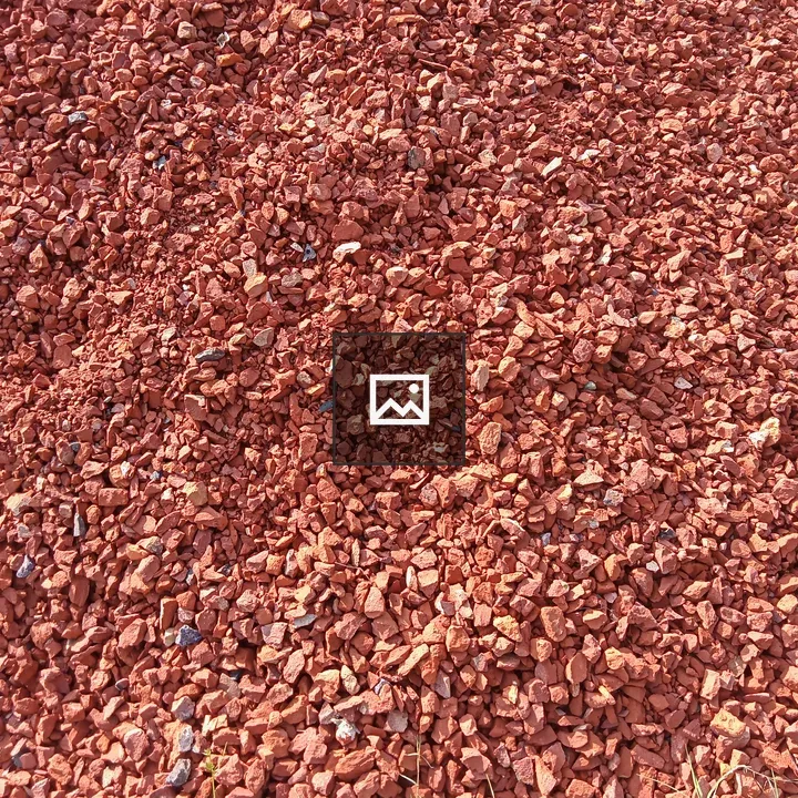 Reddish-brown crushed brick mound