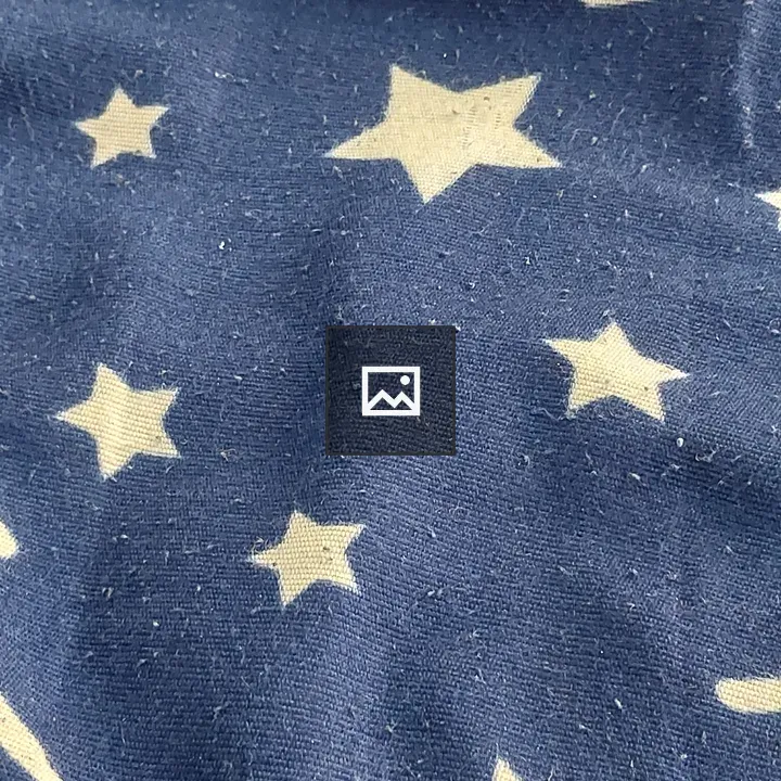 White stars on blue fabric