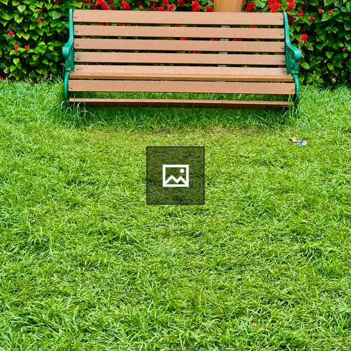 Wooden Bench with Green Armrests