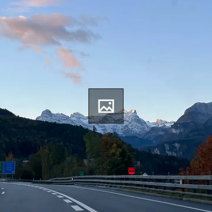 Road with Swiss mountain view