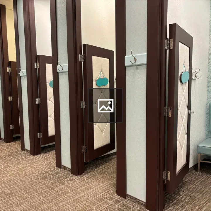 Row of Fitting Rooms in Store