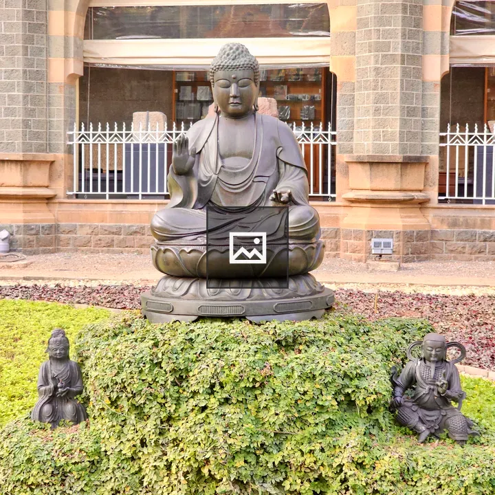 Buddha statue in garden setting