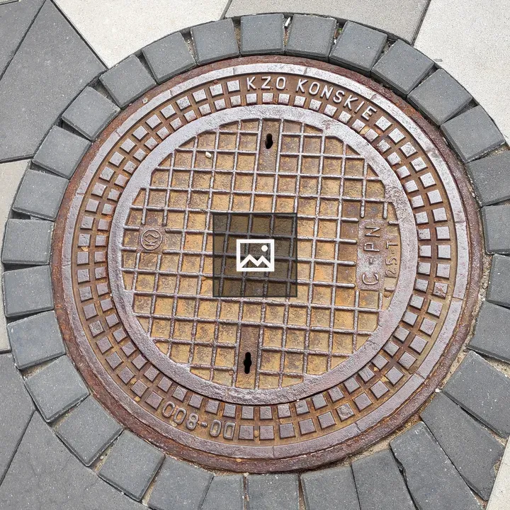 Plate Protecting Underground Canal Entrance