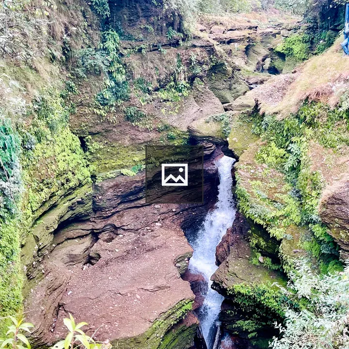 Waterfall in a rocky canyon