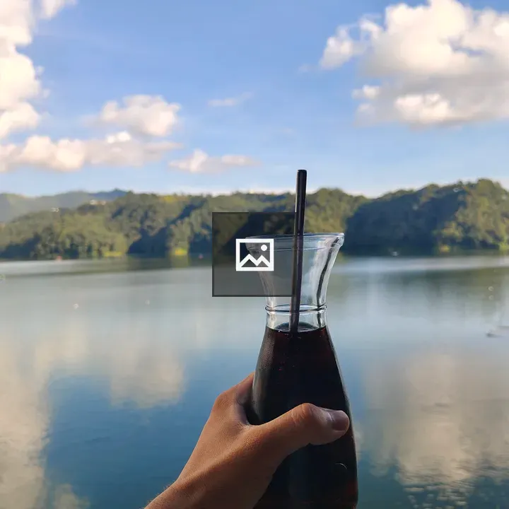 Glass carafe with dark liquid