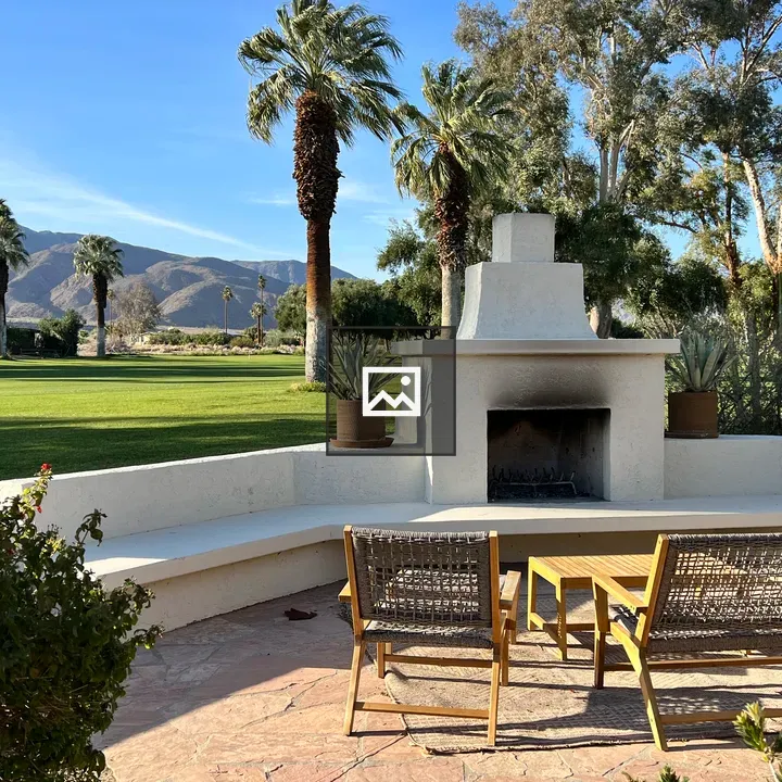 Outdoor living space with fireplace