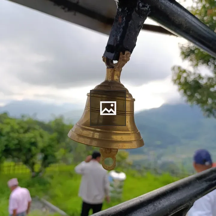 Brass Bell on Dark Frame