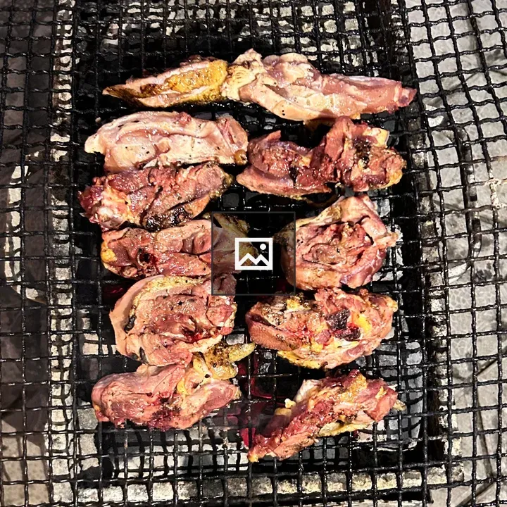 Grilling surface with marinated meat