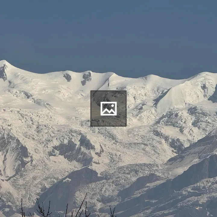 Snowy mountain peaks horizon