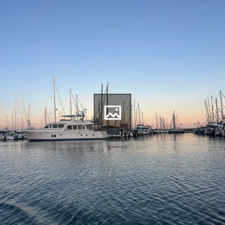 Boat at Sunset on Water