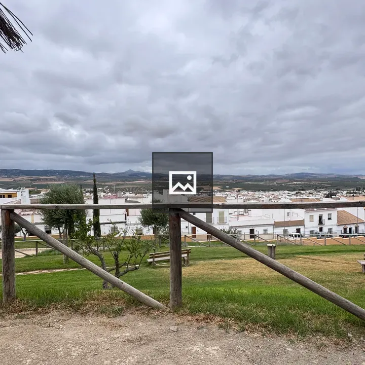 Valley scene with white buildings
