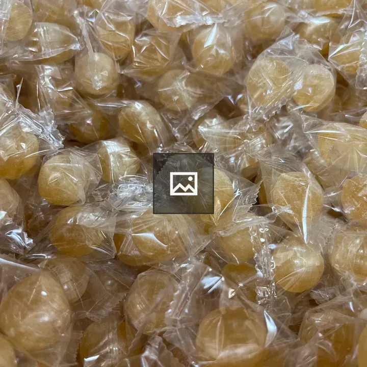Hard candies in orange and yellow