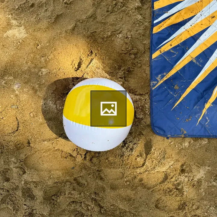 Beach ball on blanket from above