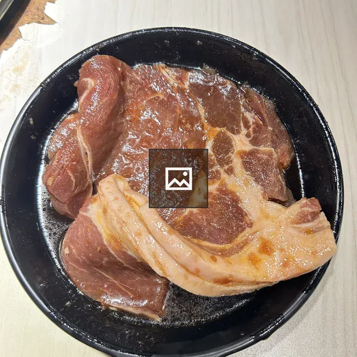 Skillet with Raw Meat