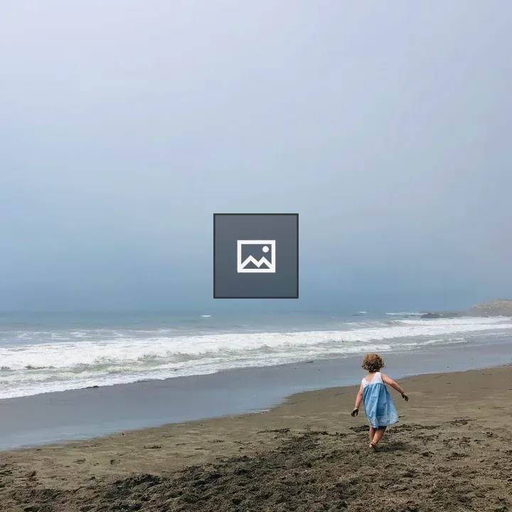 Child Playing at the Beach