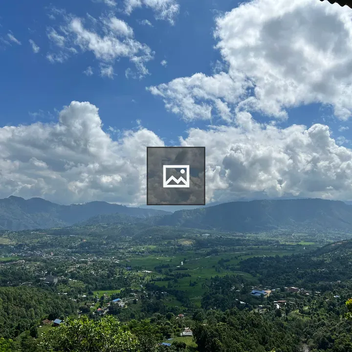 Valley town under blue sky