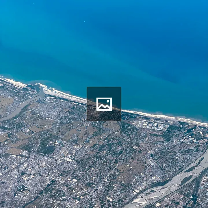 Aerial coastal city and delta