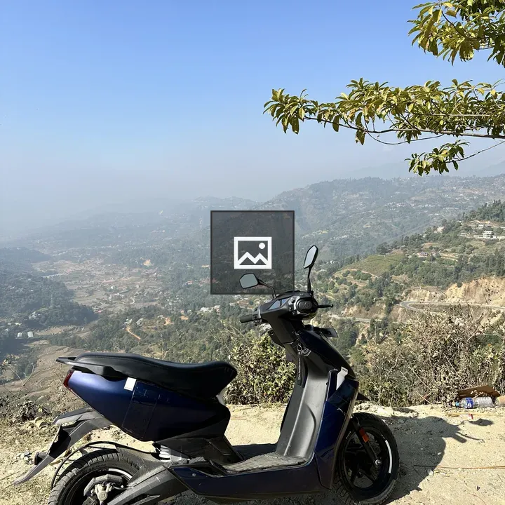 Blue electric scooter on path