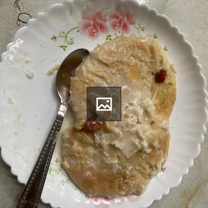 Milk-soaked Malpua on Plate