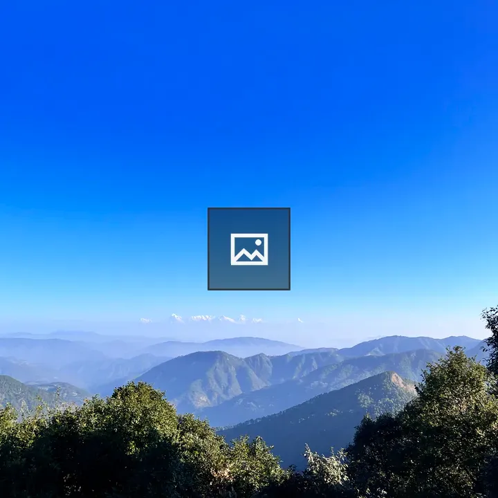 Mountain Ranges with Green Foothills