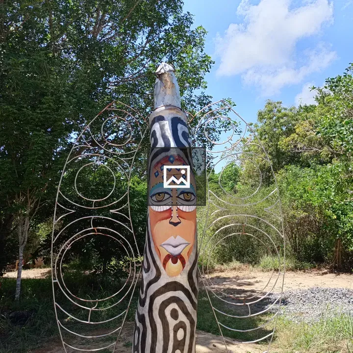 Painted Tree Trunk Sculpture